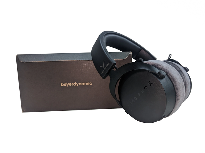 Beyerdynamic DT 700 Pro X studio headphones displayed next to their sleek packaging.
